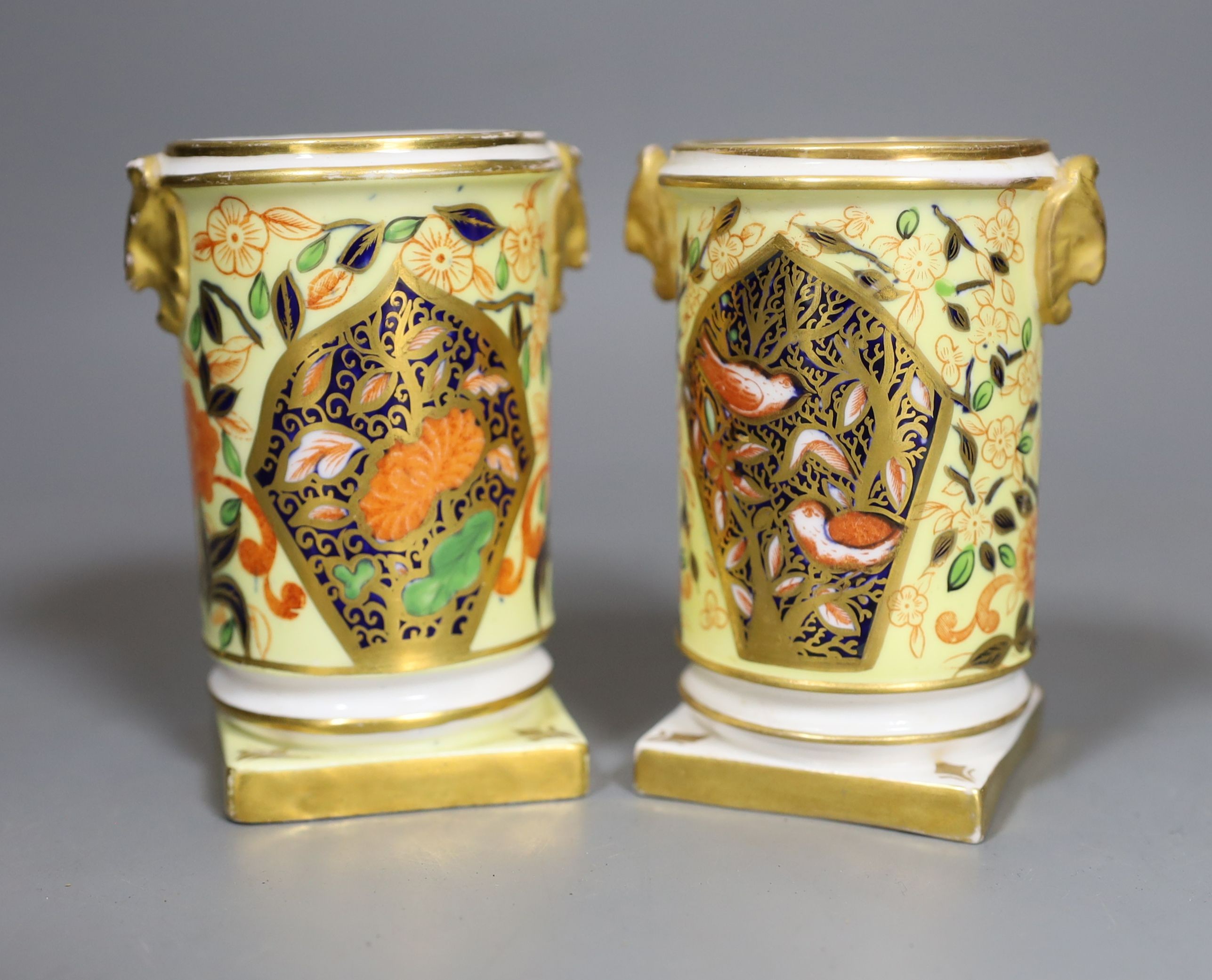 A pair of mid 19th century Crown Derby spill vases, 10cms high.